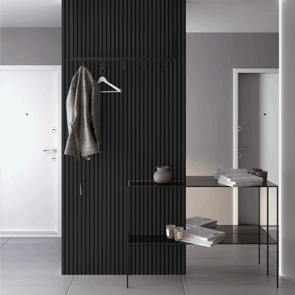 Couloir moderne avec cloison noire et portes.