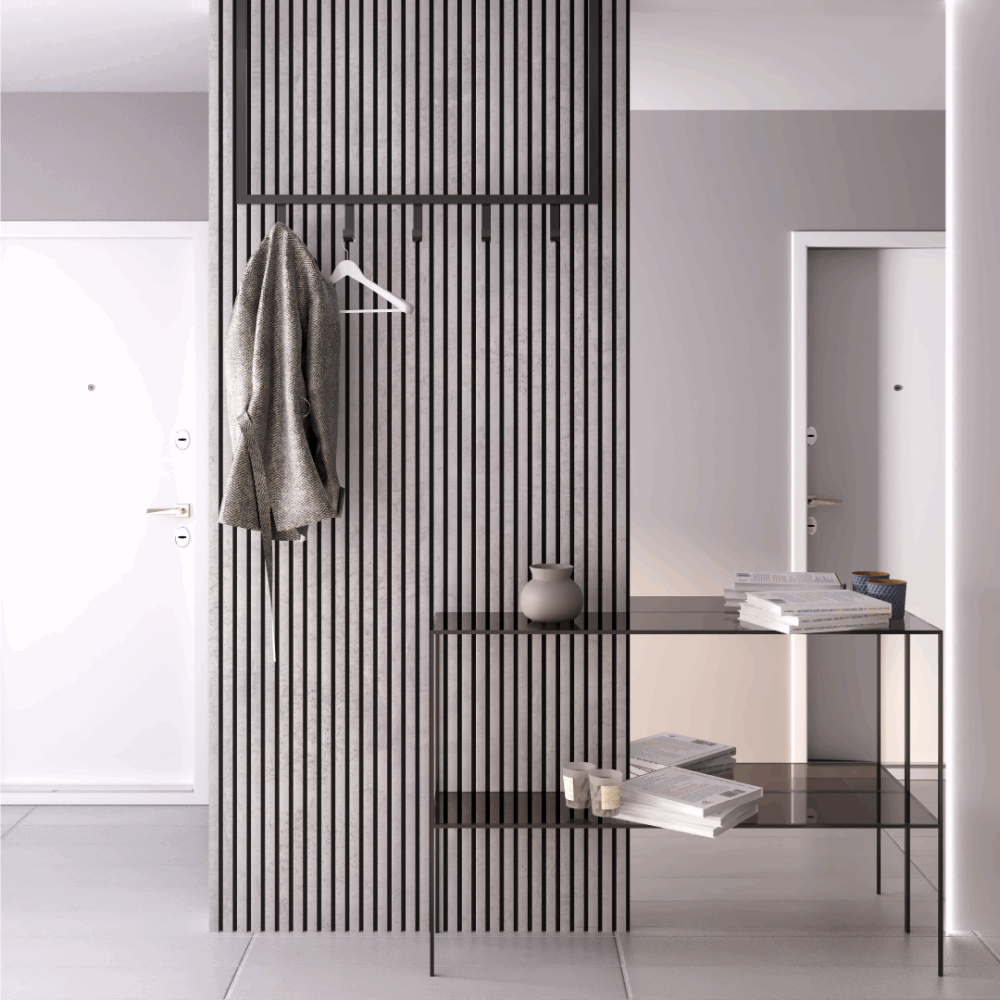 Couloir minimaliste avec porte-manteau et table.